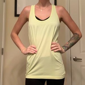 Pastel neon yellow tank top, stretchy material
